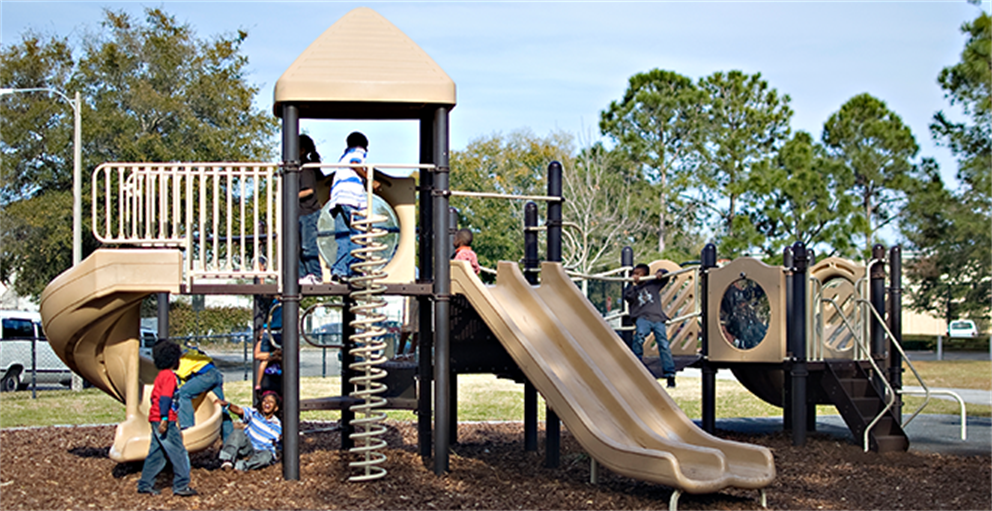 Children on the playground at Rosemont Neighborhood Center.